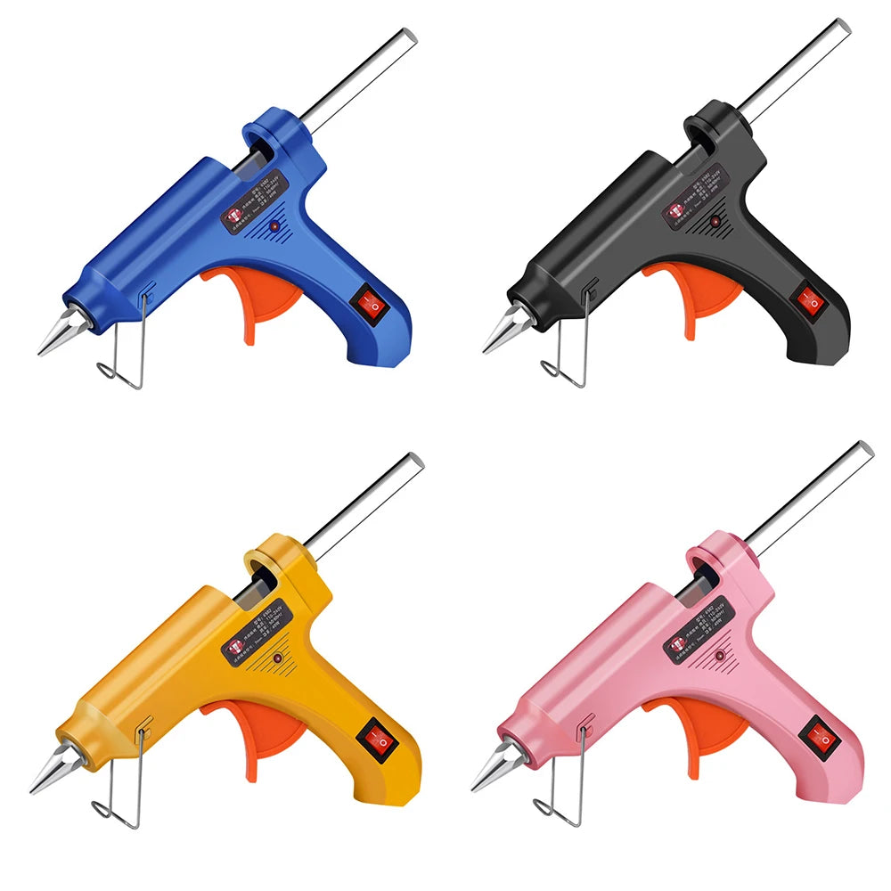 Four color of  hot glue guns - blue, black. gold, and pink