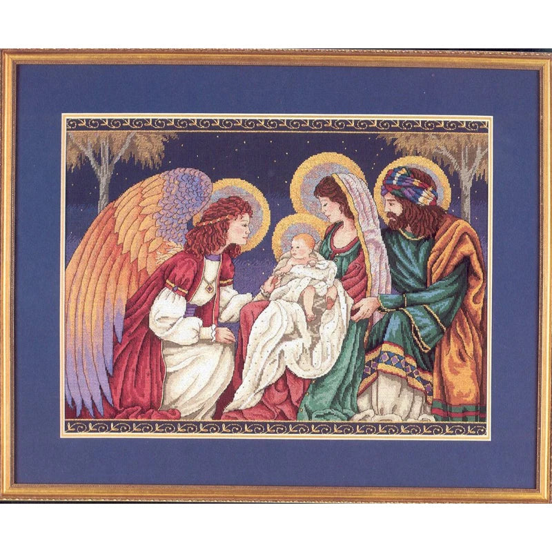 Joseph, Mary, Angel, and baby Jesus cross stitch. in a lovely frame