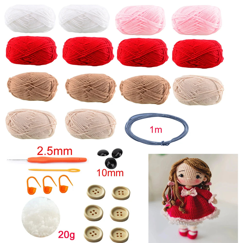 Collection of yarn balls, crochet hook, needle, buttons, and a crocheted doll wearing a red dress and supplies
