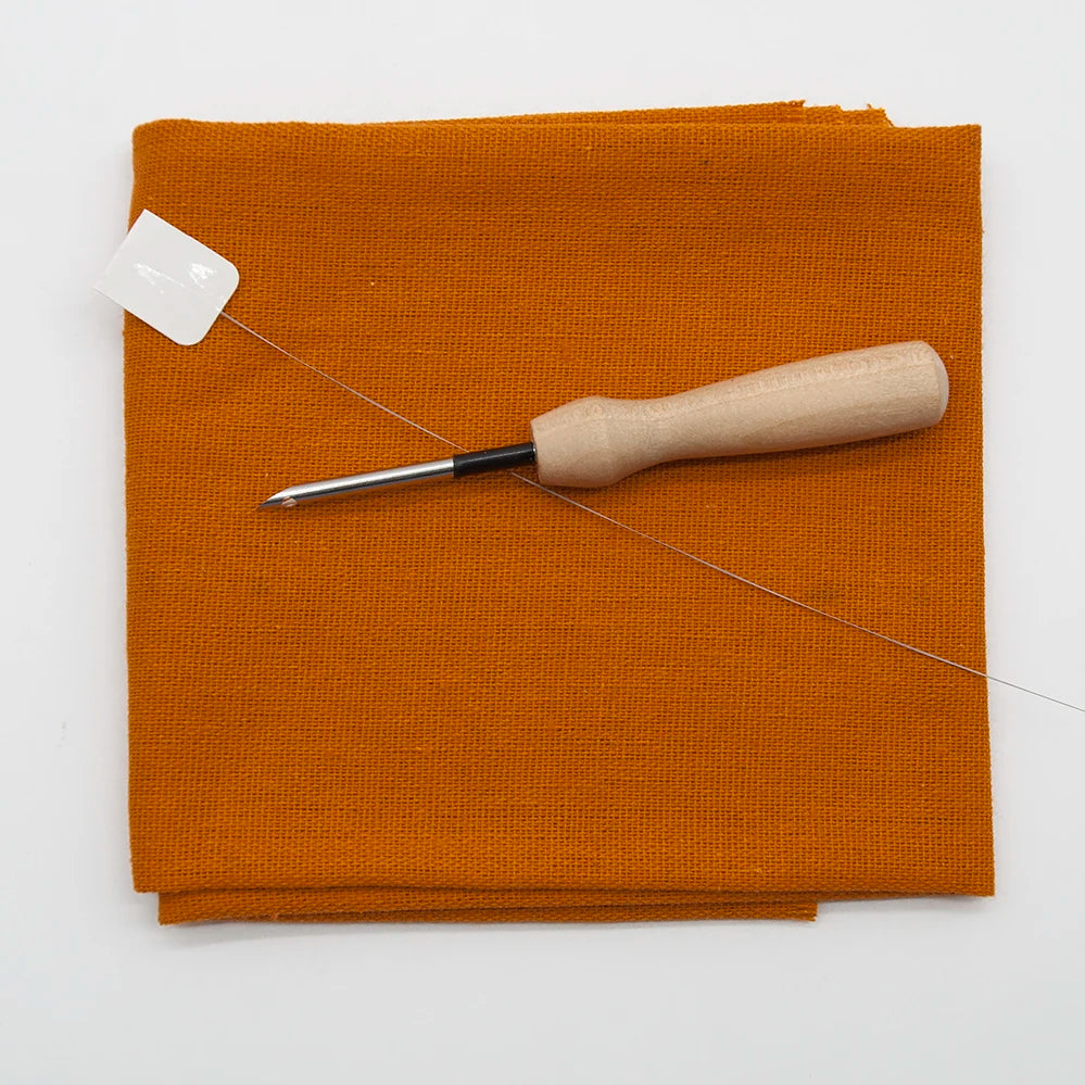 Black  punch needle cotton cloth with a Punch Needle Needle