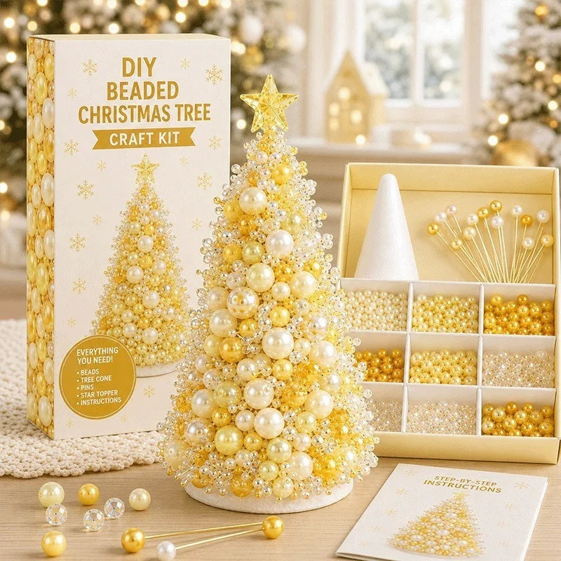 DIY Beaded Christmas Tree Craft Kit shown with its packaging box, an assembled gold, yellow and cream beaded tree, a tray of compartments filled with beads, decorative pins and an instruction booklet
