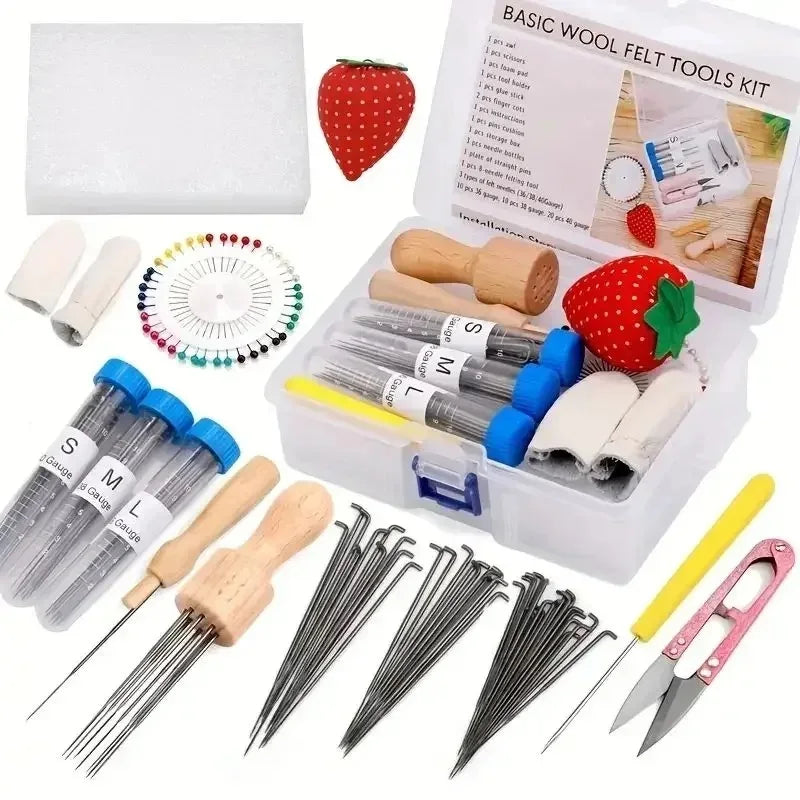 Wool felt tools kit with various needles, a box, and a strawberry model.
