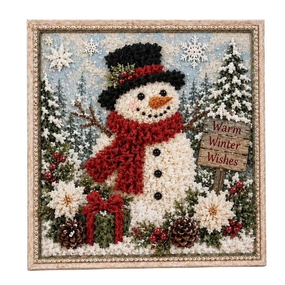 A square framed Christmas Punch needle artwork featuring a snowman with a black top hat, red scarf, and orange carrot nose, surrounded by snowy trees, white flowers, pinecones, and a wooden sign that reads 'Warm Winter Wishes.'.
