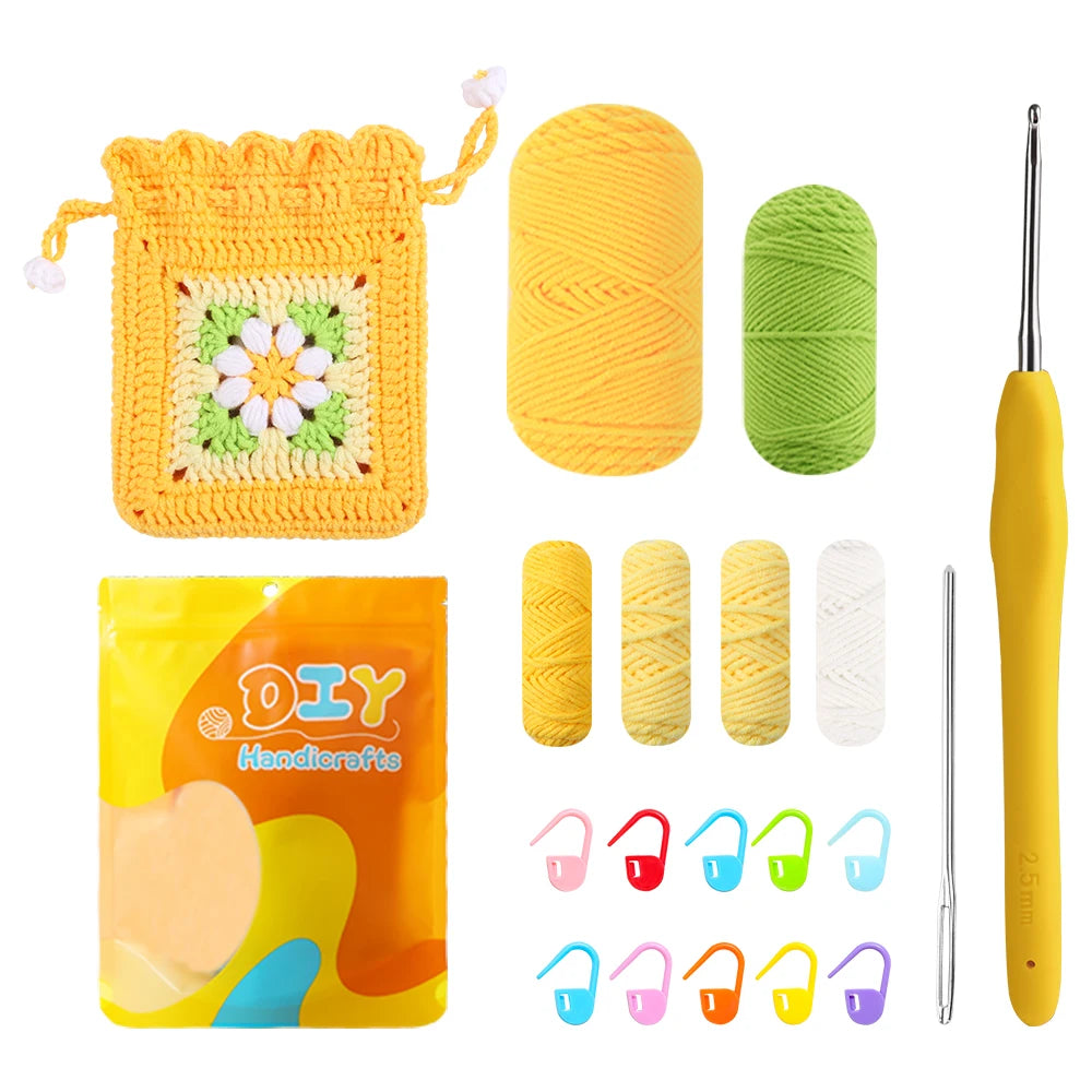 Crochet kit with yarn, crochet hook, needle, stitch markers showing asmall yellow  pouch