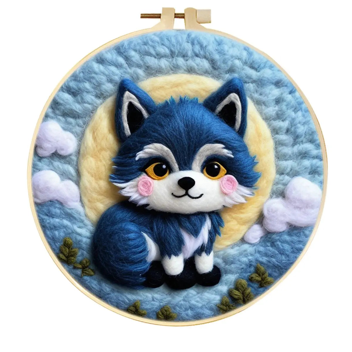 Baby blue & white needle felted fox with the sun in the background against a blue sky with white clouds in a hoop frame.