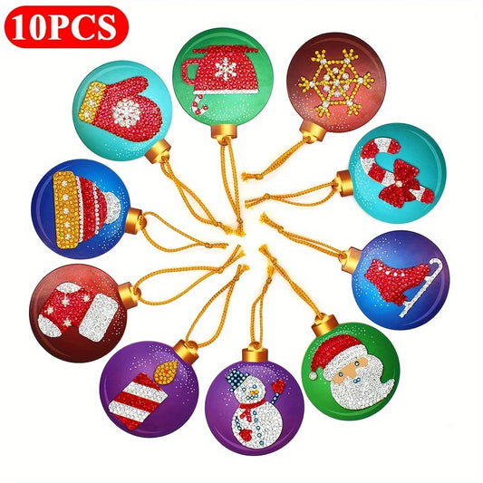 A 10-piece set of round Christmas diamond painting ornaments arranged in a circle on a white background. Each ornament features a different festive design, including a red mitten, green sleigh, snowflake, candy cane, Santa, snowman, and other holiday motifs, with gold hanging strings.
