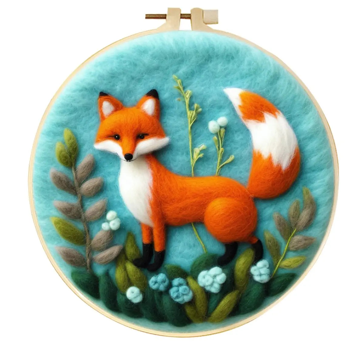 Needle felted Red fox standing amongst greenery with some flowers on a light blue background in a hoop frame