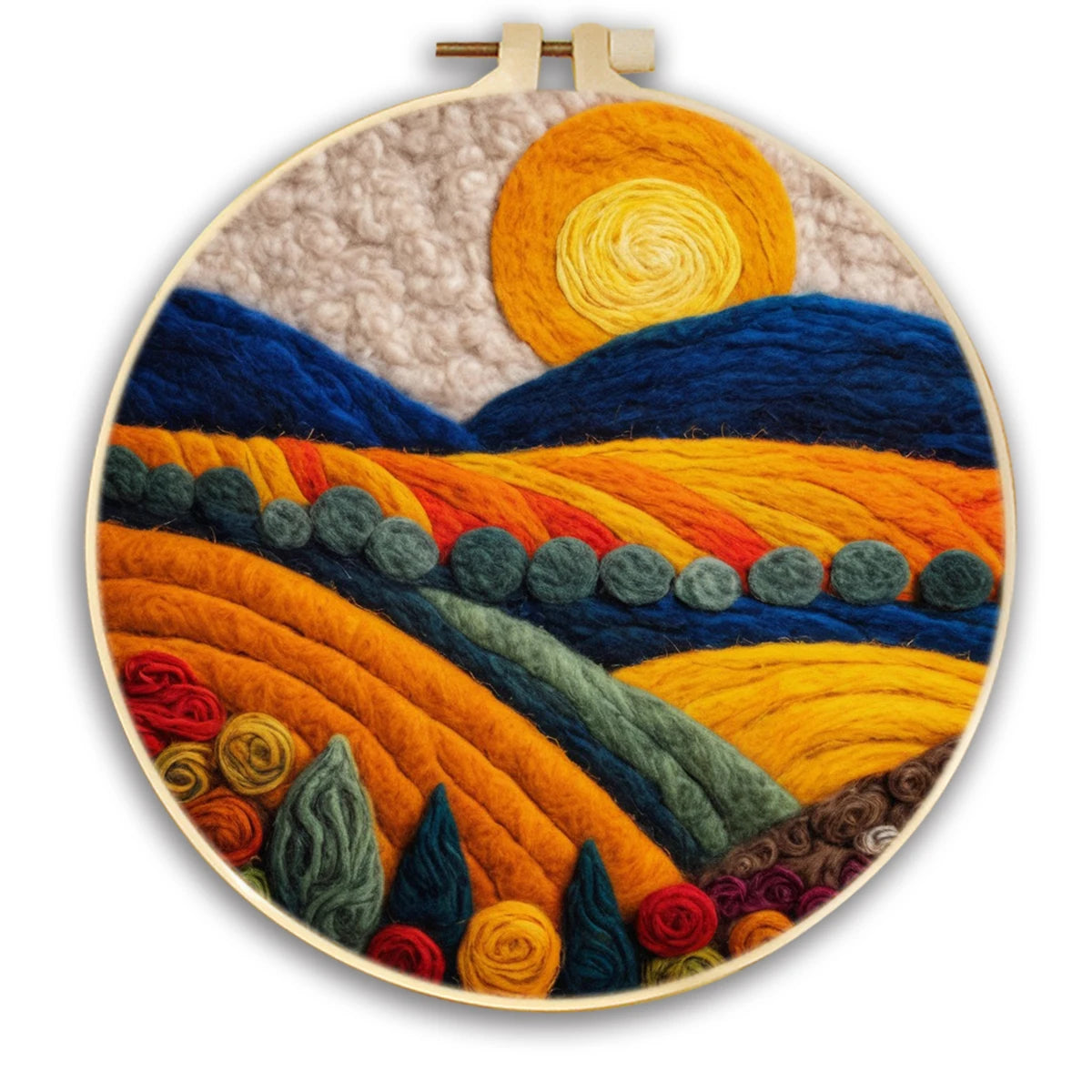 A round hoop framing a colorful and vibrant, textured needle felted art piece depicting rolling hills, cultivated fields, trees, and a bright sun over a cream background.