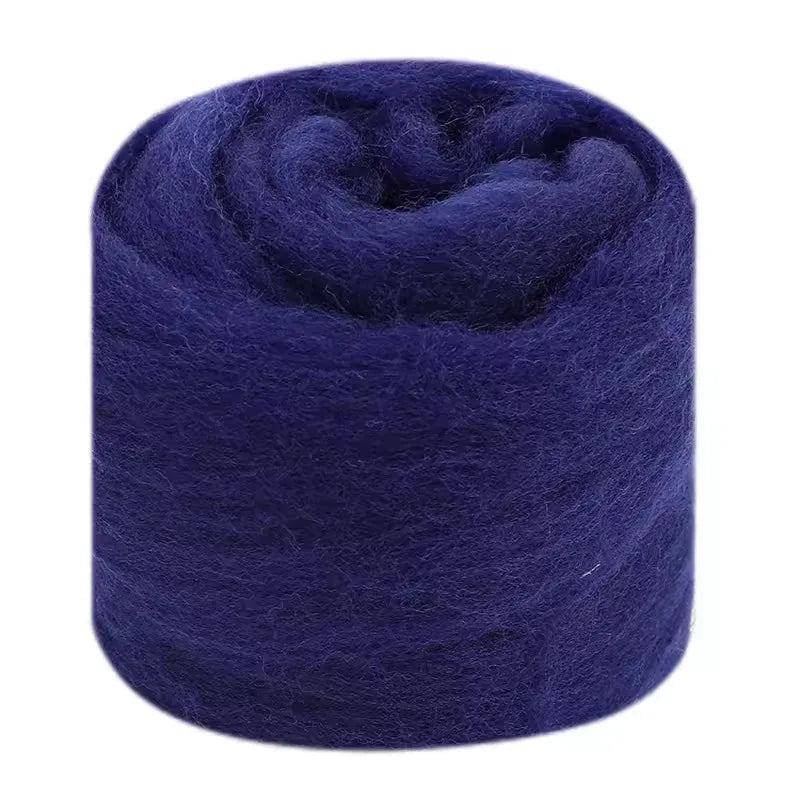 Navy lue wool roving on a white background