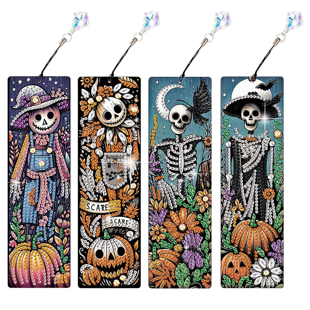 Four Halloween-themed decorative bookmarks with crystal tassel headers, featuring colorful illustrated skeletons, pumpkins, flowers, and spooky scenes 