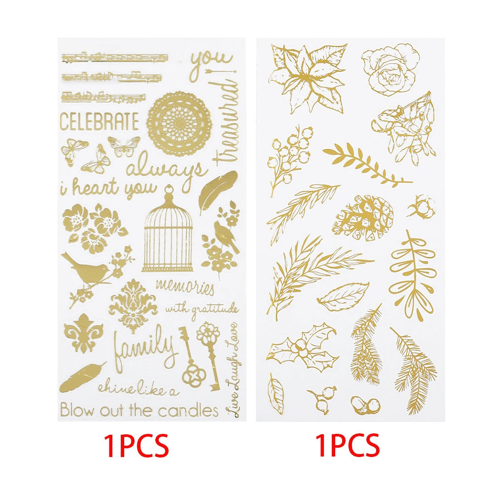 Two sheets of clear stickers with gold foil designs, including floral illustrations, birds, musical notes, and decorative phrases, shown side by side  with red '1PCS' text below each sheet.