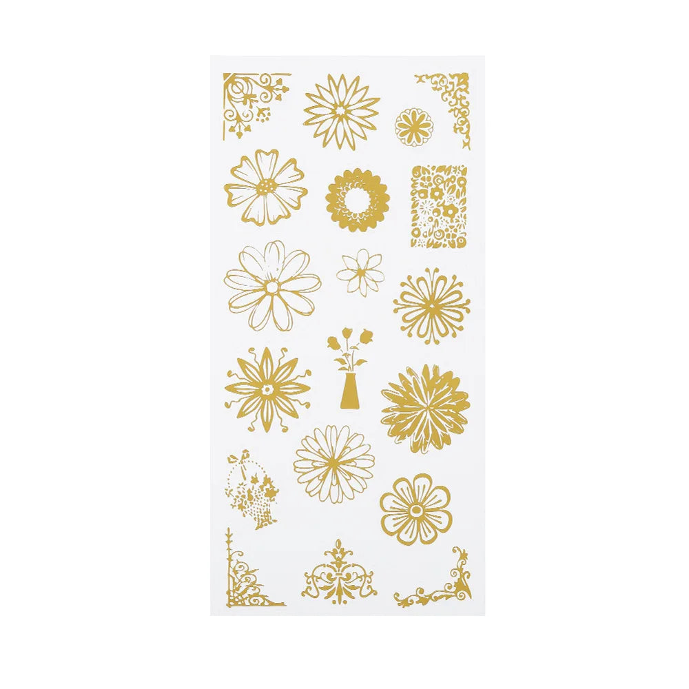 A sheet of various gold floral and decorative stencil designs 